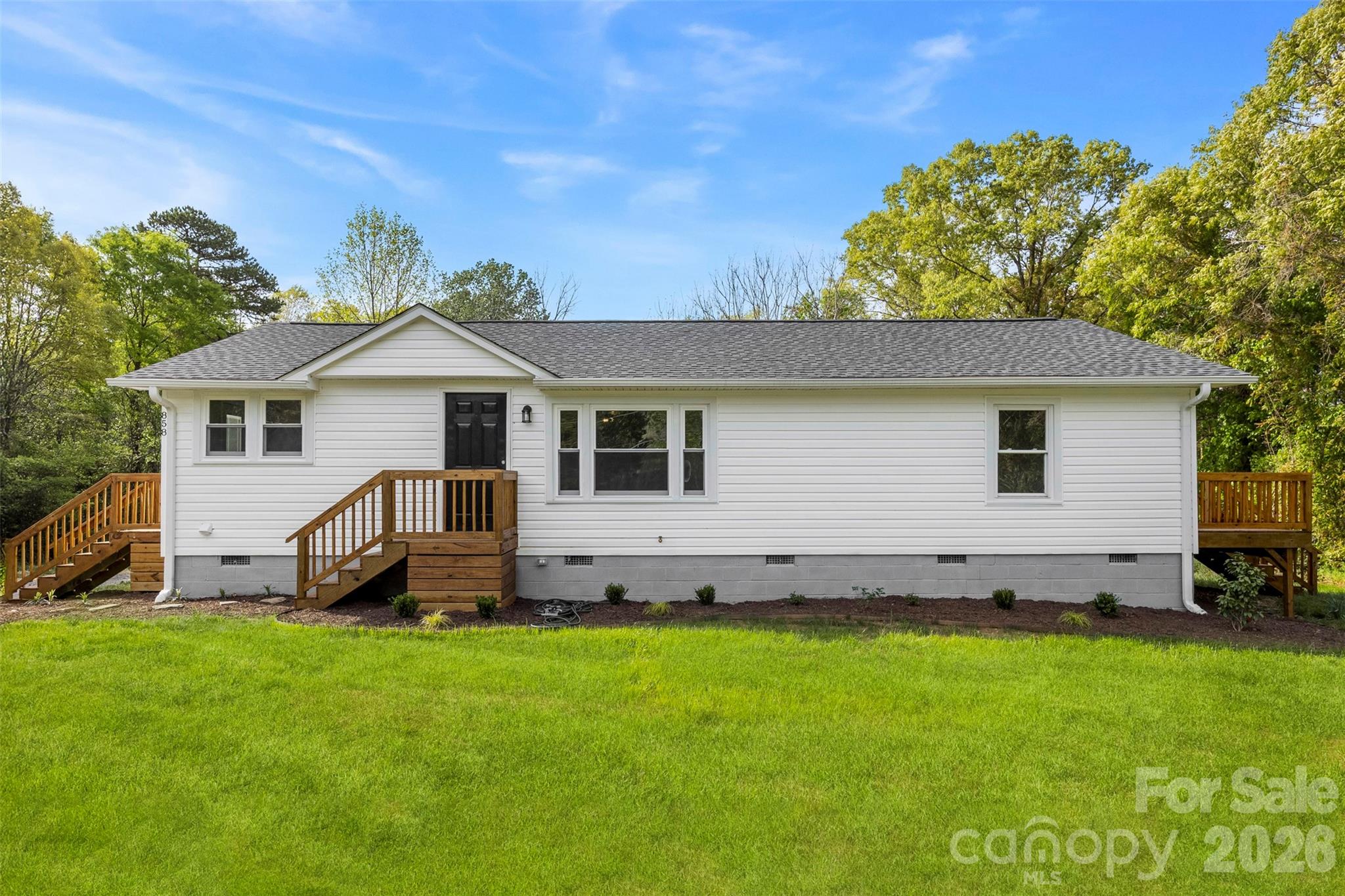 858 High Shoals Church Road Mooresboro, NC 28114 - Photo 2 of 25 a view of a house with a yard and sitting area