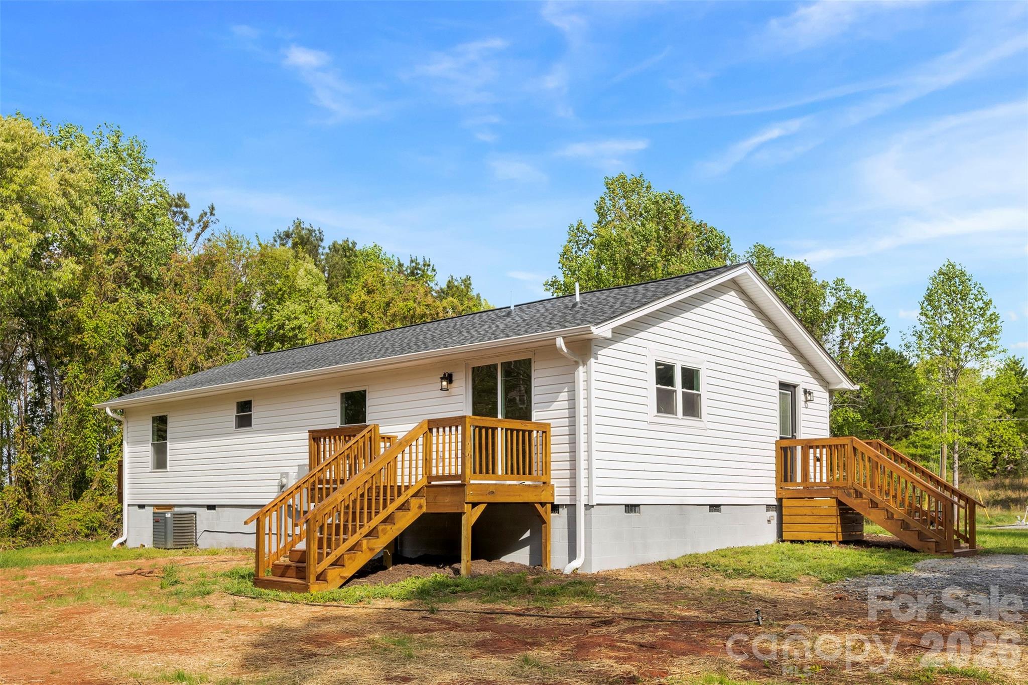 858 High Shoals Church Road Mooresboro, NC 28114 - Photo 23 of 25 a view of a house with a patio