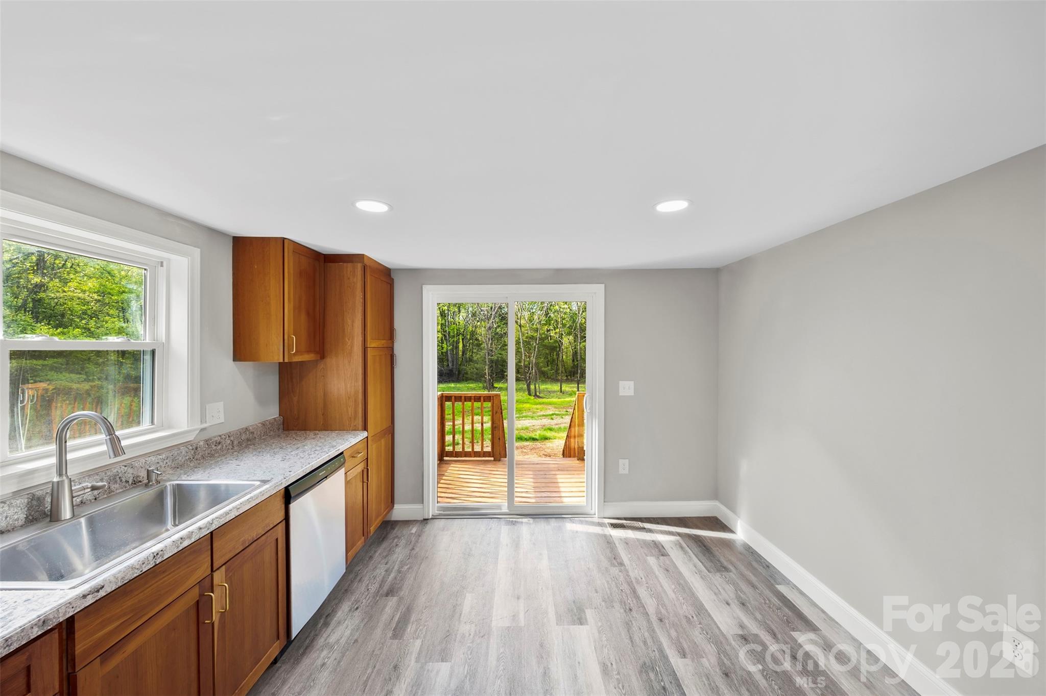 858 High Shoals Church Road Mooresboro, NC 28114 - Photo 8 of 25 a view of a kitchen with a sink and a large window