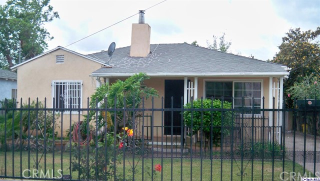 a house view with a garden space