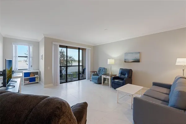 a bedroom with furniture or couch and a window