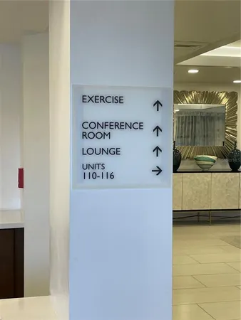 a view of a hallway with washer and dryer