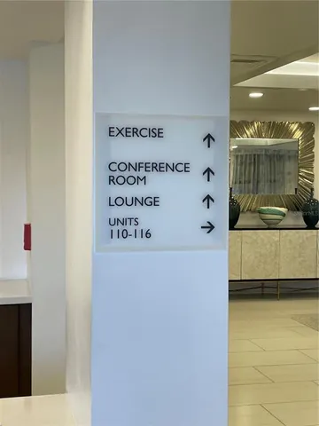 a view of a hallway with washer and dryer