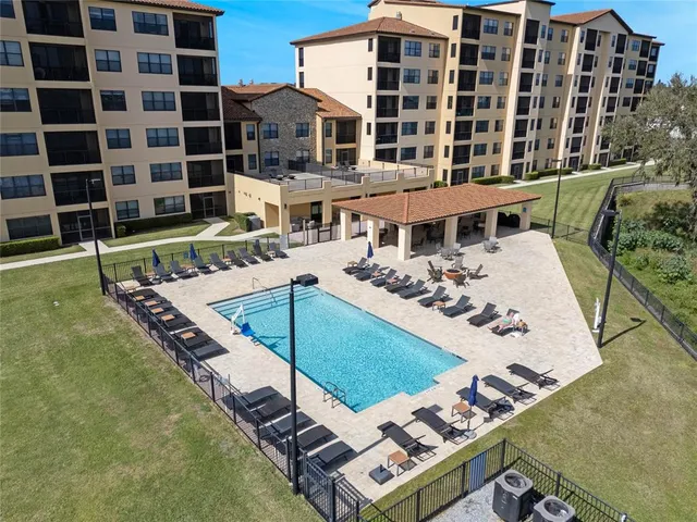 a view of a patio with swimming pool