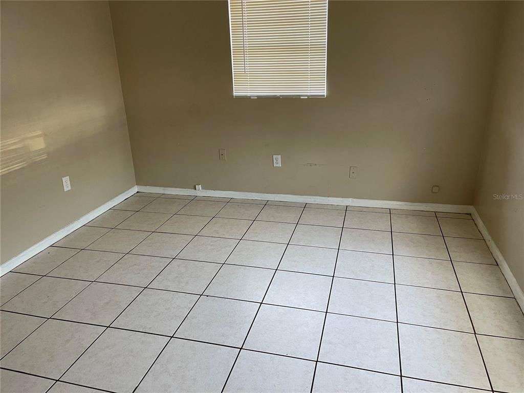 5924 Pine Street New Port Richey, FL 34652 - Photo 16 of 20 a view of an empty room and window