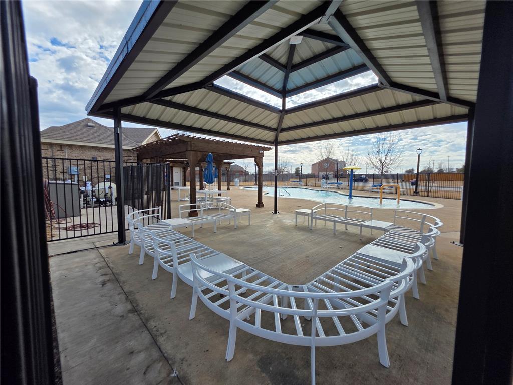 149 Ryan Street Anna, TX 75409 - Photo 37 of 38 a view of a swimming pool with a patio