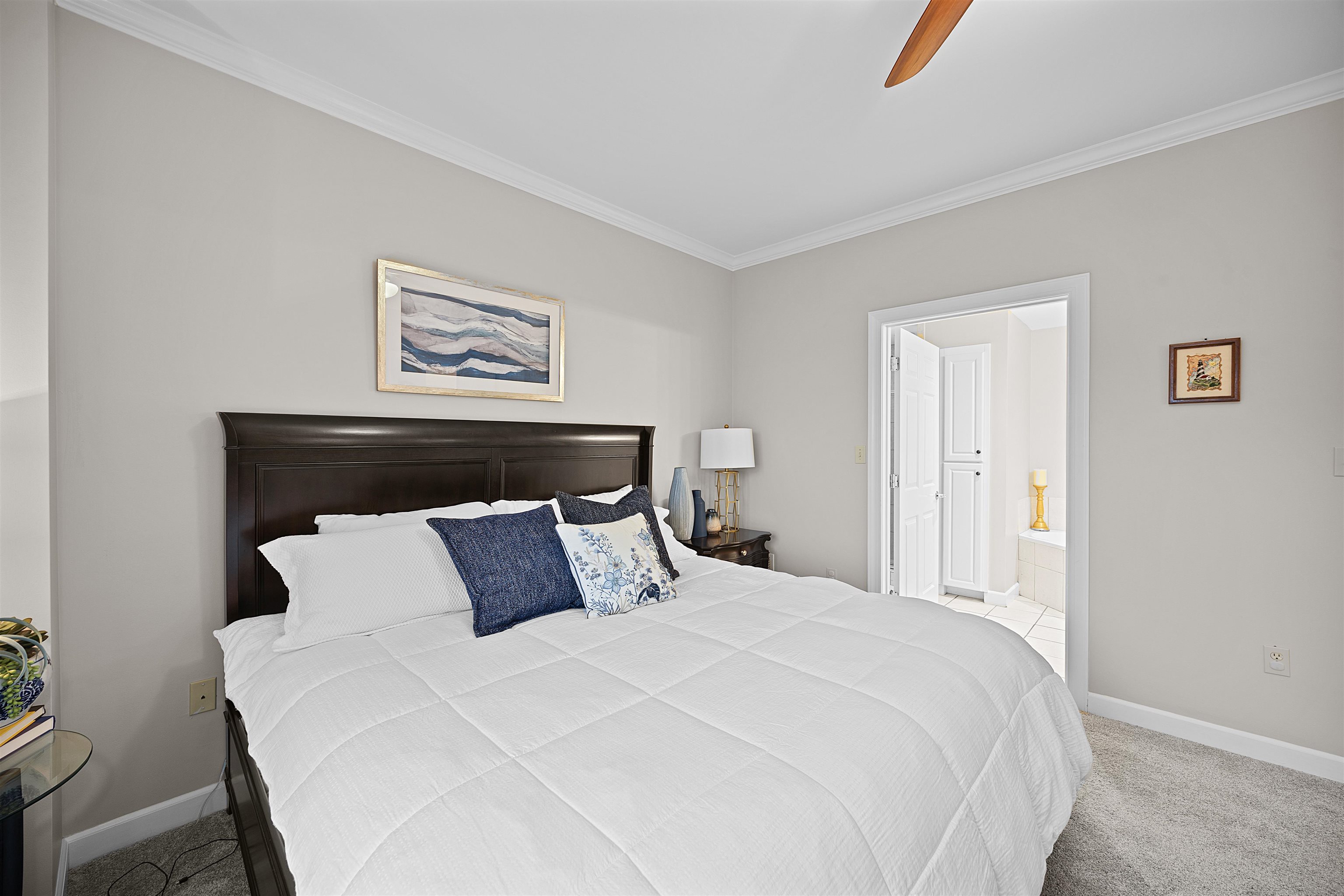 25 Cr 380 Road, Unit P 204 Iuka, MS 38852 - Photo 13 of 19 Bedroom featuring crown molding, carpet floors, ensuite bathroom, and ceiling fan