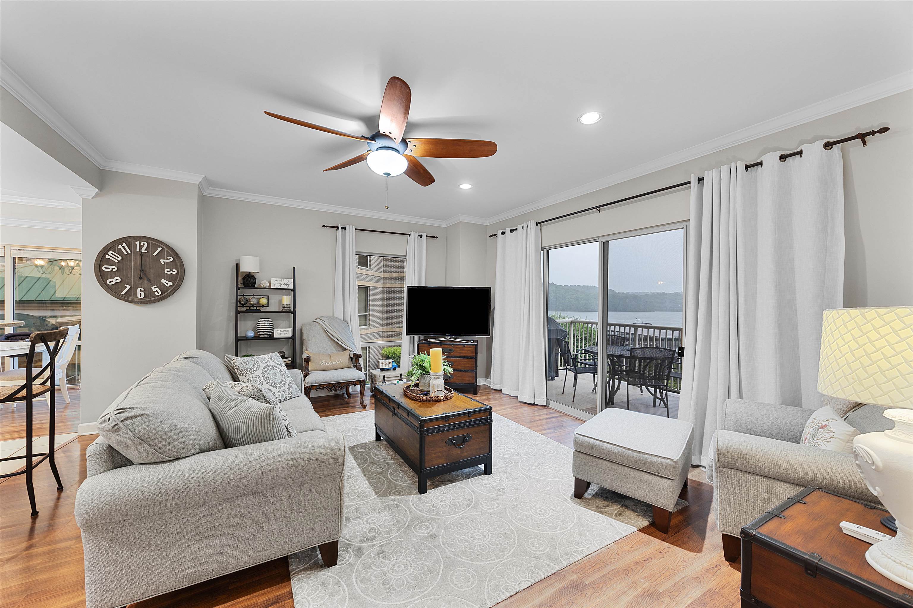 25 Cr 380 Road, Unit P 204 Iuka, MS 38852 - Photo 2 of 19 Living room featuring ceiling fan, light wood-style floors, ornamental molding, and recessed lighting