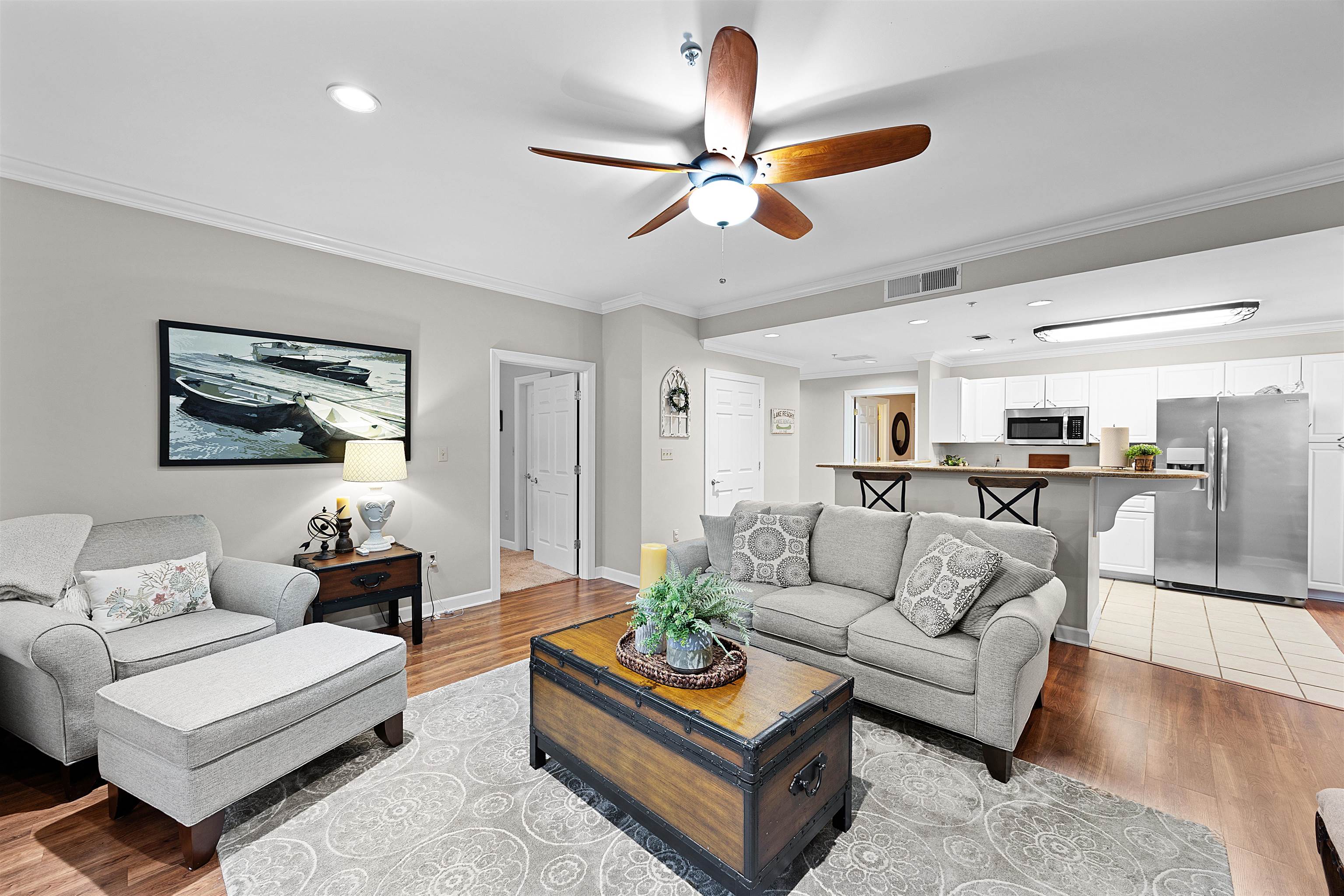 25 Cr 380 Road, Unit P 204 Iuka, MS 38852 - Photo 4 of 19 Living room with a ceiling fan, crown molding, recessed lighting, and light wood-type flooring