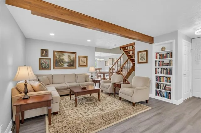 a kitchen with stainless steel appliances a refrigerator stove and sink