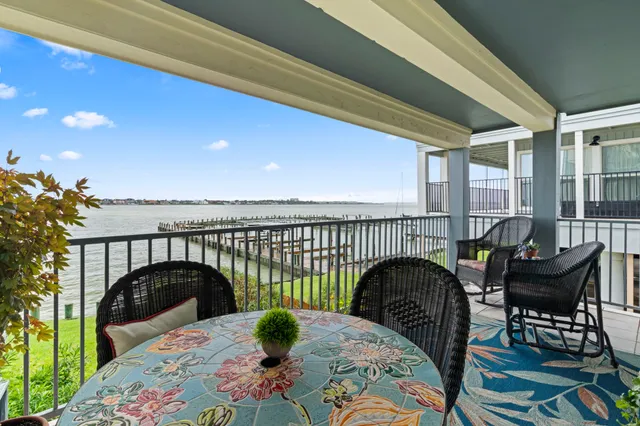 a front view of a building with a yard