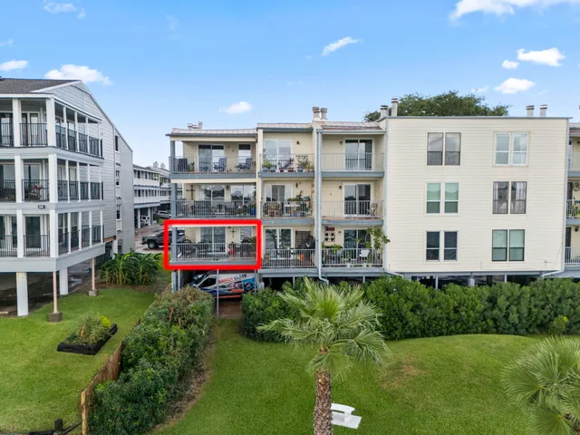 a view of a building with a yard