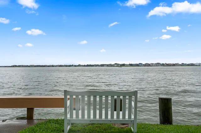 a view of a garden with a lake view