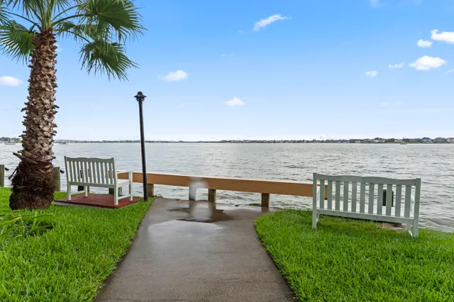 a view of a balcony with furniture