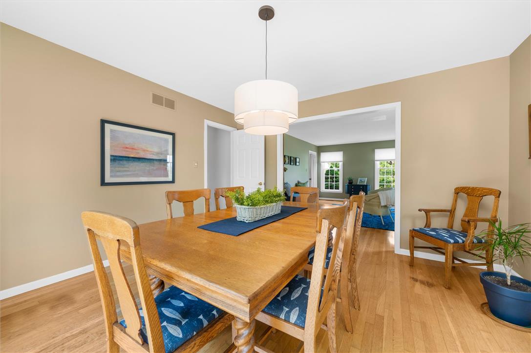 5616 Snowdrift Road Orefield, PA 18069 - Photo 9 of 36 Hardwood floors flow through this welcoming dining room, perfect for entertaining.