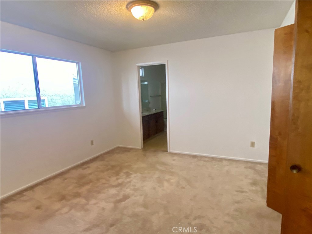 3219 Tide Avenue Morro Bay, CA 93442 - Photo 13 of 23 an empty room with window