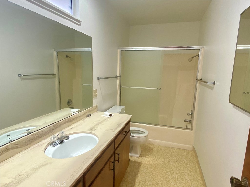 3219 Tide Avenue Morro Bay, CA 93442 - Photo 15 of 23 a bathroom with a sink toilet tub and shower