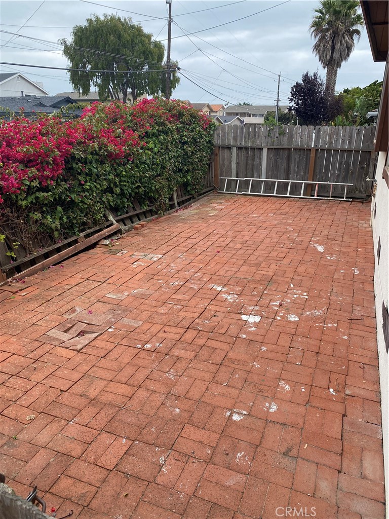 3219 Tide Avenue Morro Bay, CA 93442 - Photo 22 of 23 a view of a pathway with a yard
