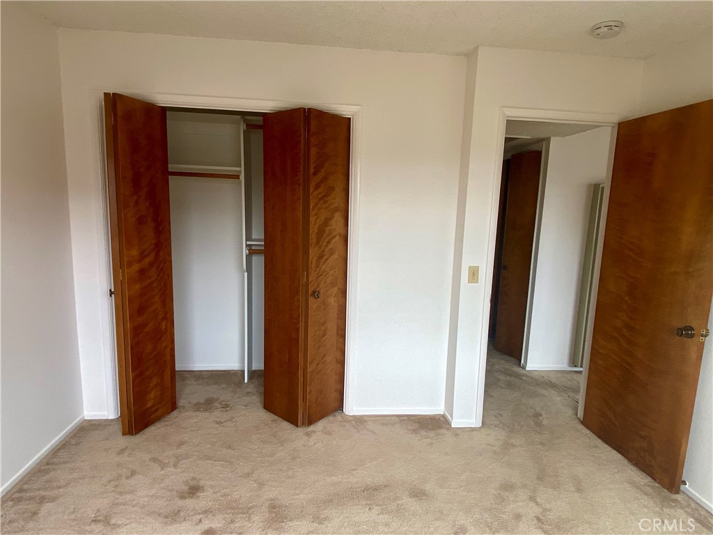 3219 Tide Avenue Morro Bay, CA 93442 - Photo 10 of 23 an empty room with closet and a bathroom