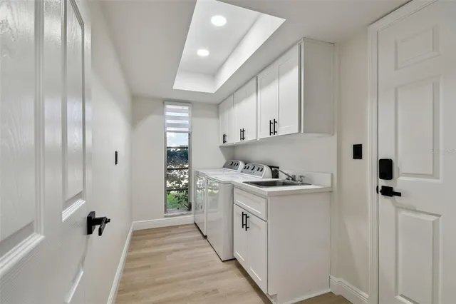 a kitchen with stainless steel appliances granite countertop a stove and a refrigerator