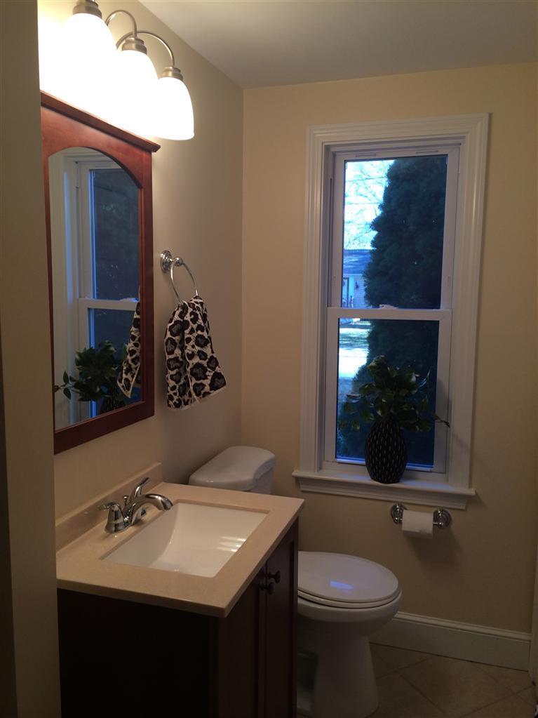 163 Guildford Road Centerville, MA 02632 - Photo 14 of 29 a bathroom with a sink and a mirror