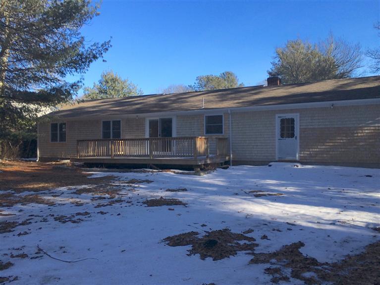163 Guildford Road Centerville, MA 02632 - Photo 26 of 29 a view of a house with a yard