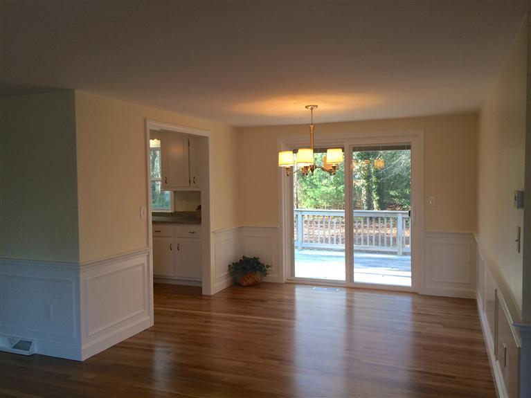 163 Guildford Road Centerville, MA 02632 - Photo 3 of 29 wooden floor in an empty room with a window