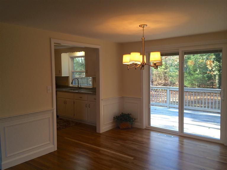163 Guildford Road Centerville, MA 02632 - Photo 5 of 29 a view of a room with wooden floor fan and windows