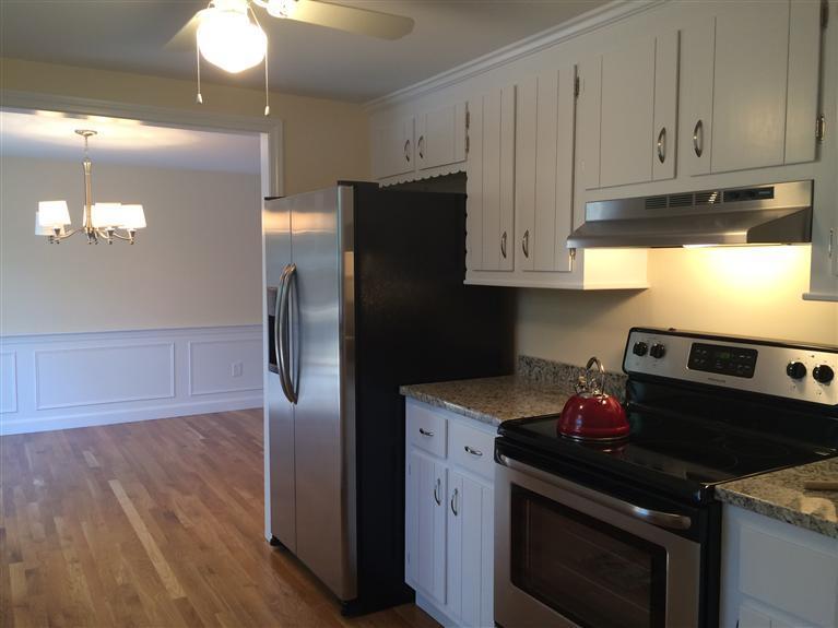 163 Guildford Road Centerville, MA 02632 - Photo 9 of 29 a kitchen with stainless steel appliances granite countertop a refrigerator stove and sink