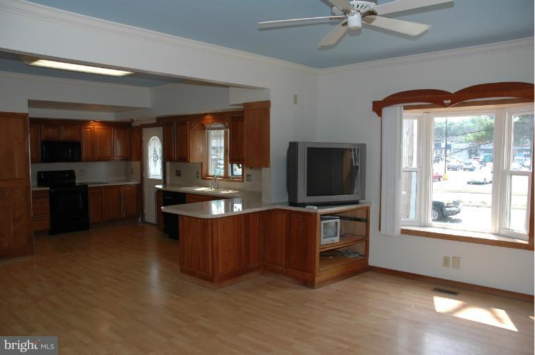 8483 Fort Smallwood Road Pasadena, MD 21122 - Photo 5 of 15 Kitchen & Dining Area