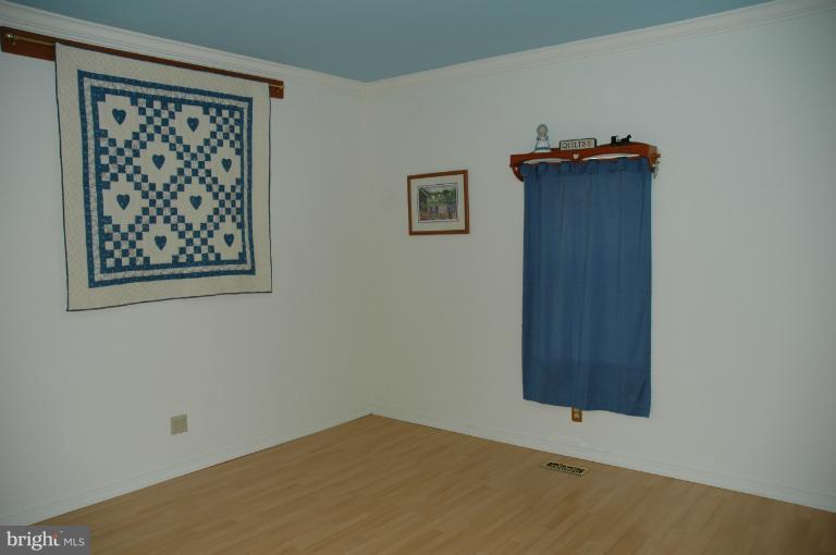 8483 Fort Smallwood Road Pasadena, MD 21122 - Photo 7 of 15 Living Room #1