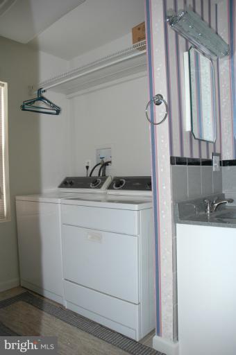 8483 Fort Smallwood Road Pasadena, MD 21122 - Photo 10 of 15 Laundry