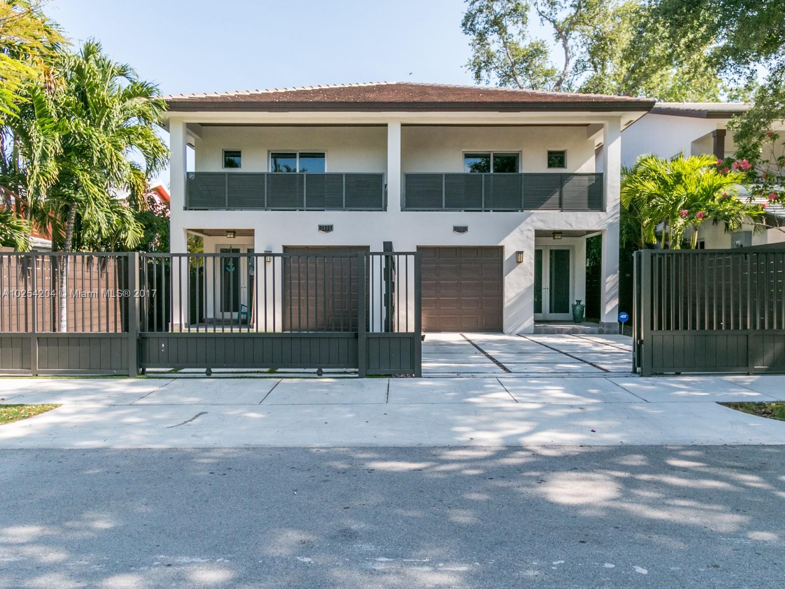 a front view of a house with a porch