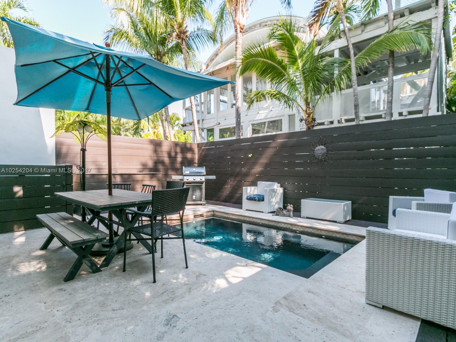 2993 Ruth Street, Unit 2993 Coconut Grove, FL 33133 - Photo 28 of 29 a view of house with outdoor seating space