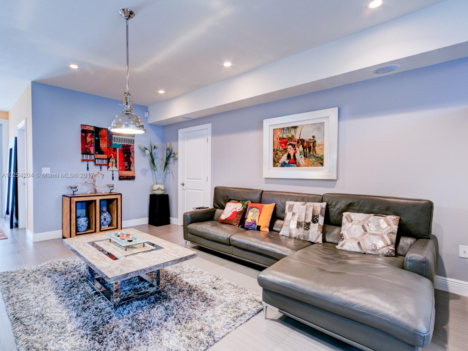 2993 Ruth Street, Unit 2993 Coconut Grove, FL 33133 - Photo 5 of 29 a living room with furniture and kitchen view