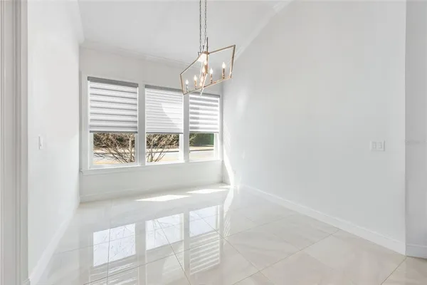 a view of a room with a large window