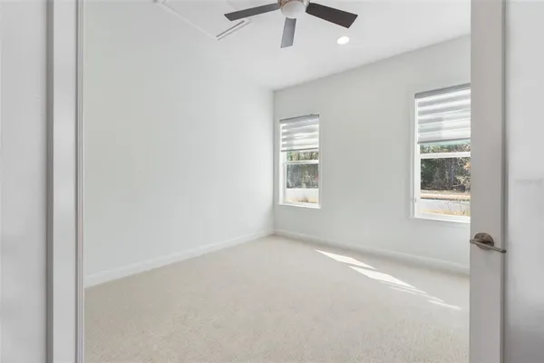 an empty room with windows