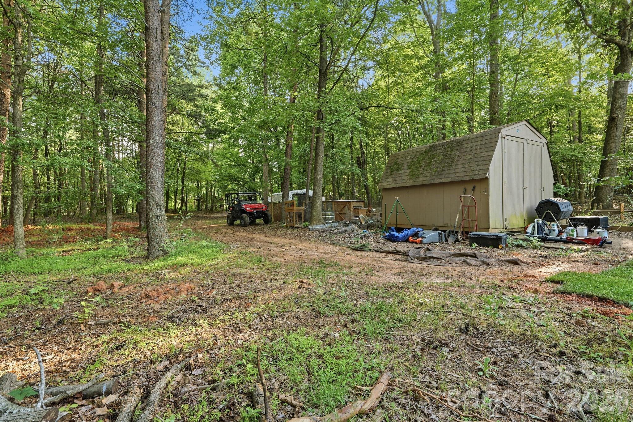 5347 Haney Road York, SC 29745 - Photo 37 of 39 a view of backyard with tub and trees