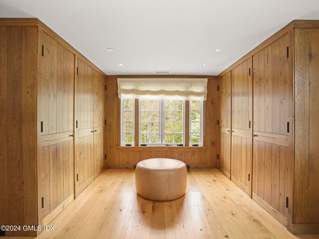 a very nice looking bathroom with a large window and tub