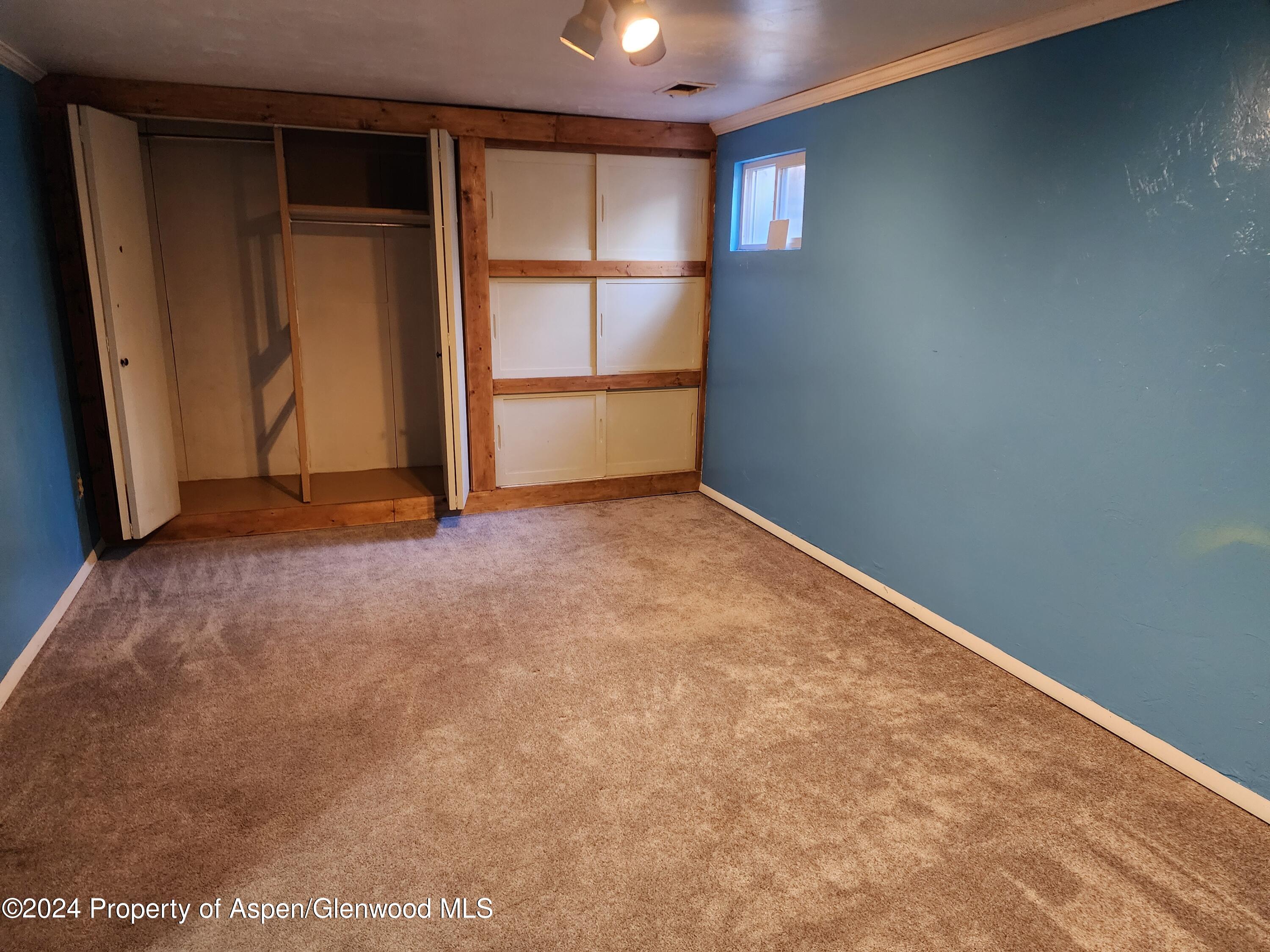 525 East 12th Street Rifle, CO 81650 - Photo 16 of 26 an empty room with closet area