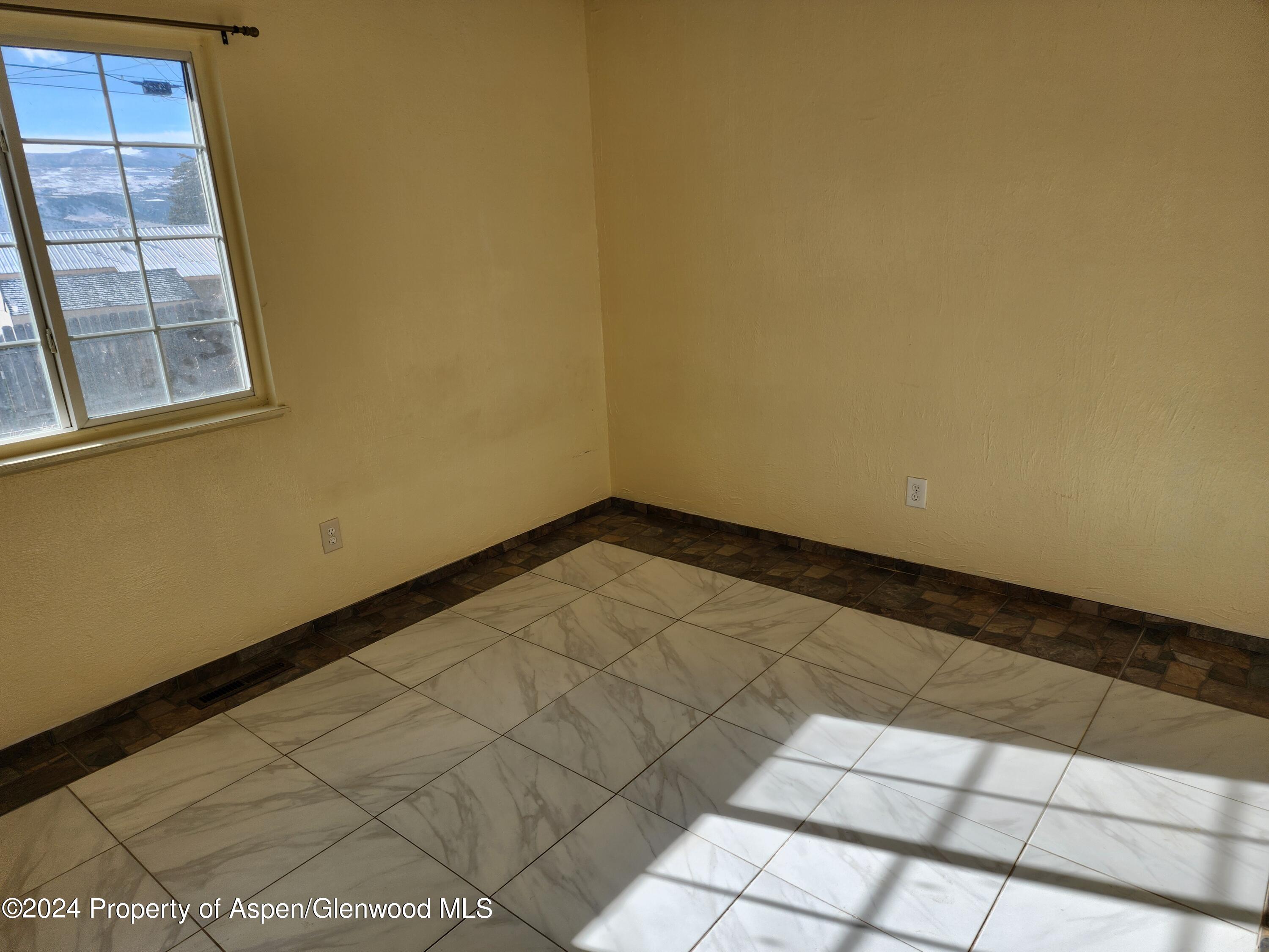525 East 12th Street Rifle, CO 81650 - Photo 19 of 26 a view of an empty room and window
