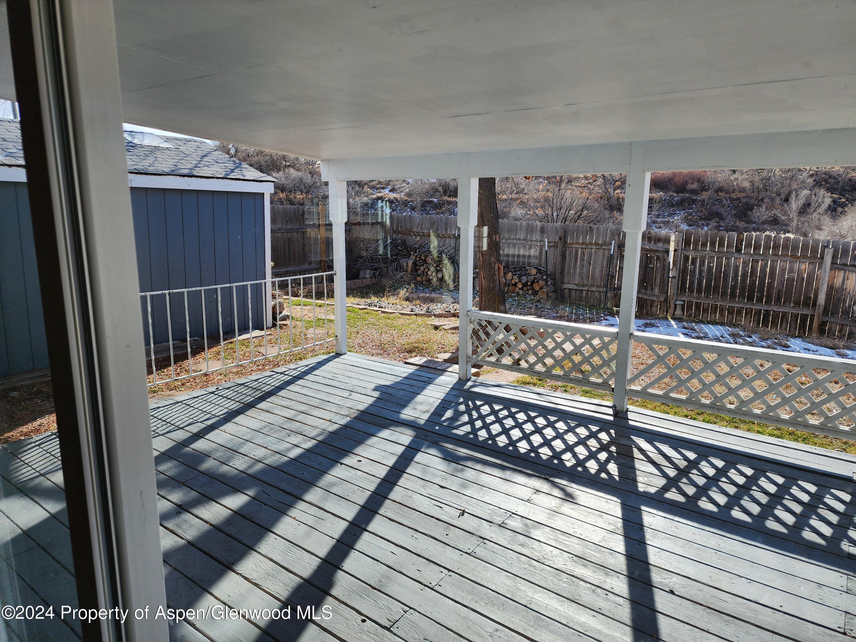 525 East 12th Street Rifle, CO 81650 - Photo 24 of 26 a view of balcony with wooden floor