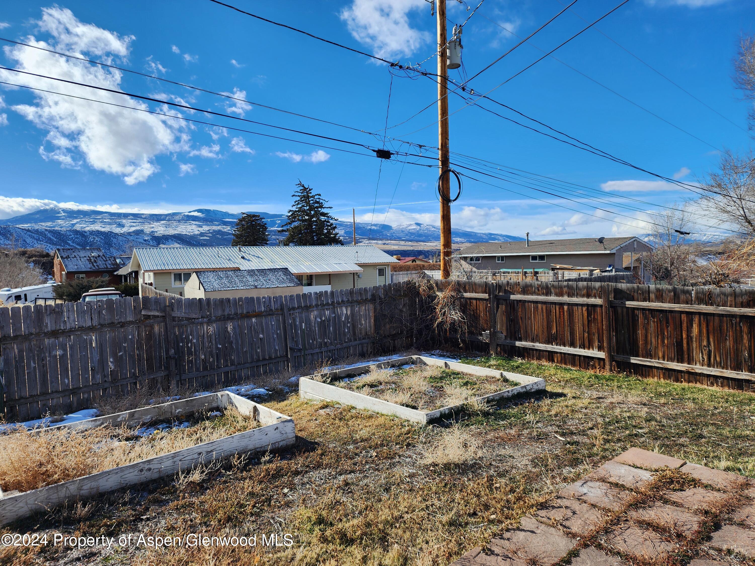 525 East 12th Street Rifle, CO 81650 - Photo 6 of 26 a view of swimming pool with a patio