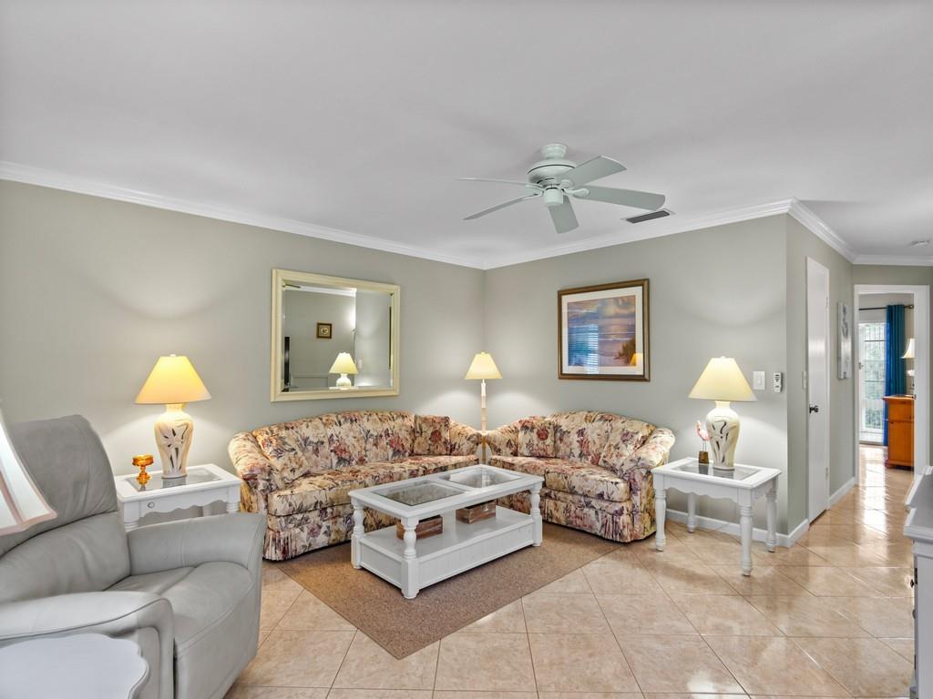 5400 Highway A1a, Unit I25 Vero Beach, FL 32963 - Photo 4 of 39 a spacious bedroom with a bed and window