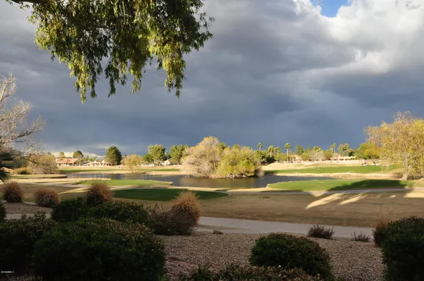 a view of mountain with lake view