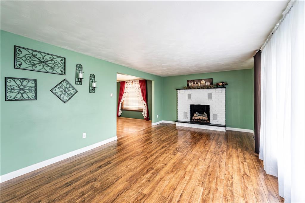 687 Middletown Road New Stanton, PA 15672 - Photo 16 of 42 Living room with gas logs