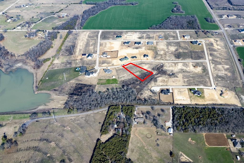 Aerial map of property and surrounding area with property parcel outlined