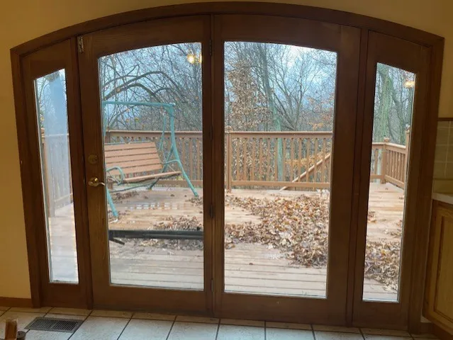 a view of a room that has a large window