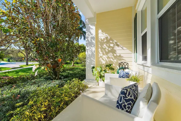 a view of balcony with furniture