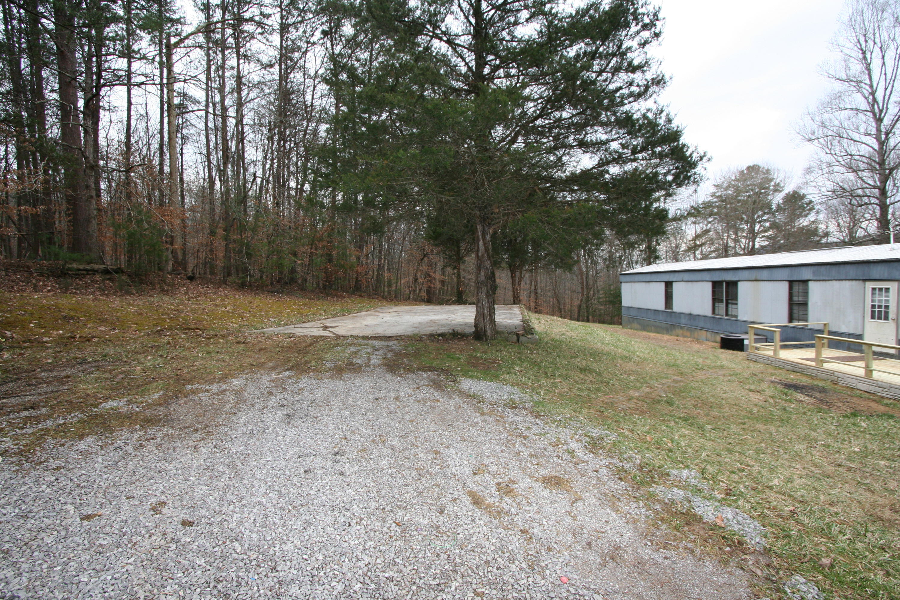 1172 Bull Run Road Luttrell, TN 37779 - Photo 5 of 21 Rear Deck & Large Concrete Pad